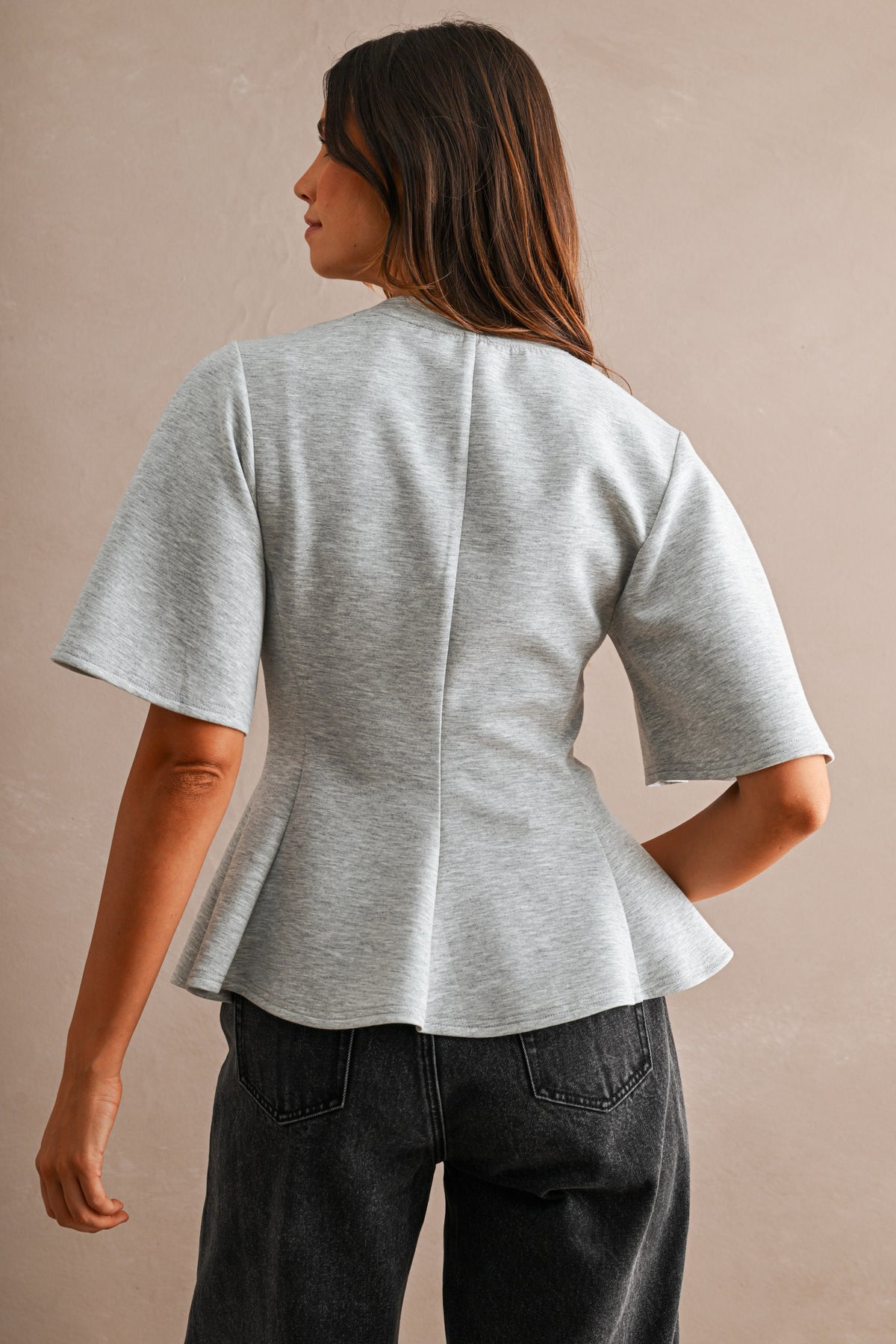 Amir Scuba Round Neck Short Sleeve Flared Peplum Hem Top