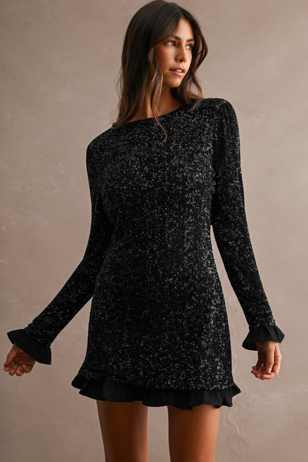Cecilia Sequin Long Sleeve Ruffle Trim Open Back Bow Tie Mini Dress